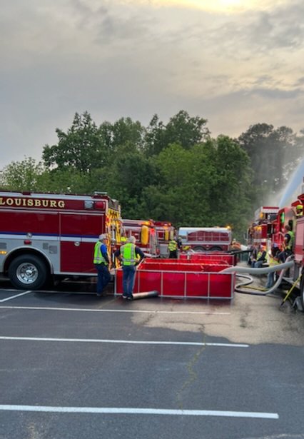 LouisburgFire's tweet photo. Lsbg Fire participated in a county wide water shuttle training on April 25th in Franklinton. 12 depts attending from Franklin, Vance and Granville counties Great night of training with other departments. https://t.co/Tva2KneXRT