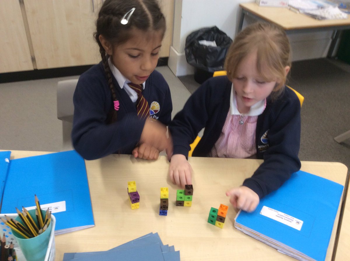 SPMVElm's tweet photo. In maths this morning we have been investigating how many equal groups you can make with 20 cubes. https://t.co/wRjymzWomy
