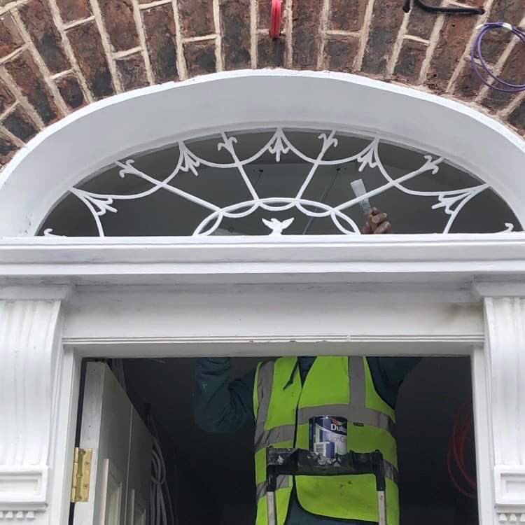 CliveFinlay1's tweet photo. Original Fan Light restored by our team. 100 yrs plus paint removed and new glass pieces being installed. Common areas (original plaster, decals &amp; door architrave refurbished &amp; restored) final push to deliver 8 x A3 BER one bed apartments. #limerick #georgian. #newenham https://t.co/0tx6myuml5