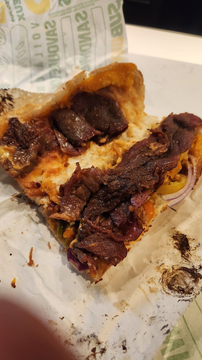 Stevehyper's tweet photo. @SUBWAYCanada so much for Subway Series sandwiches. This was just embrassing. Do better Subway! If the employees find that App orders and Customers in store is difficult find a better way. See the pictures of your handcrafted Series Brisket Sub. Subway fo better https://t.co/MWcQ1qcImL