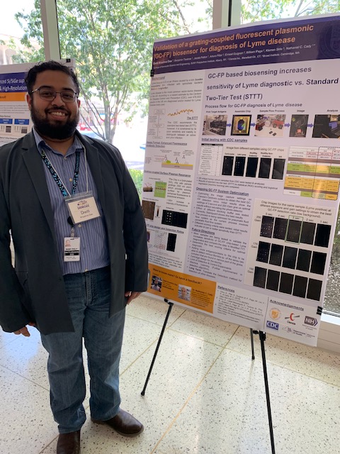 CNSE's tweet photo. Research for “real-world” challenges: @CNSE Nanobioscience student Dwiti Krushna Das (Advisor Dr. Nathaniel Cady) shares his research poster, “Validation of a grating-coupled fluorescent plasmonic biosensor for diagnosis of Lyme Disease” as part of #UAlbanyShowcase Day https://t.co/TD8iPEZ12H