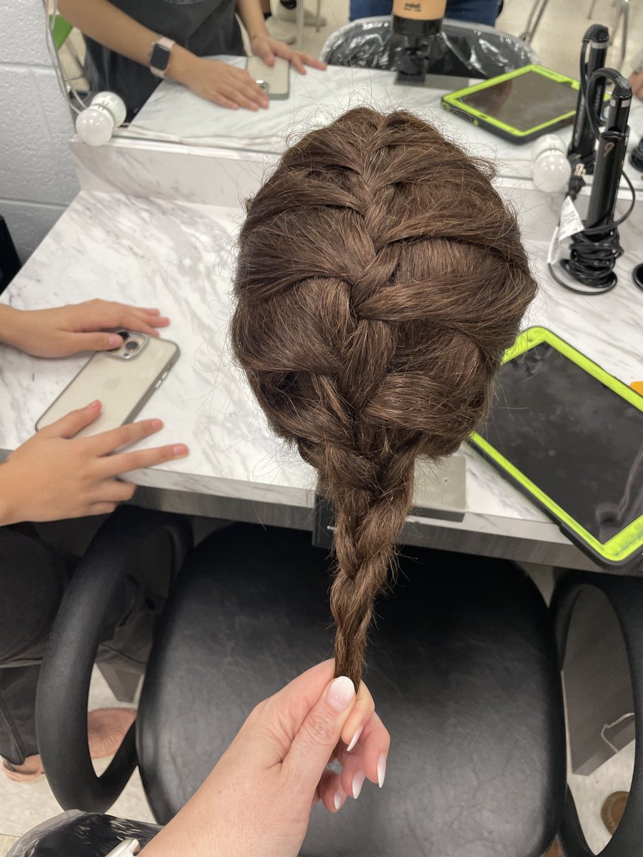 GreenWavePride's tweet photo. ⁦@KrysteldM⁩ learning some skills today in Cosmetology! ⁦@GallatinHS_CTE⁩ ⁦@SumnerCountyCTE⁩ #GWP #EarntheG Students said she needs practice! https://t.co/H9cF3j48mr
