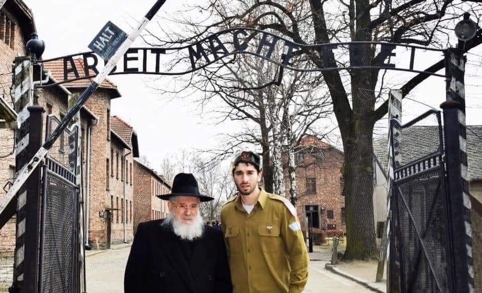 As we walked through the gates of #Auschwitz, my grandfather said: “72 years ago I walked through this gate with a soldier by my side.. a Nazi soldier... Today I once again walk through this gate with a soldier by my side.. my grandson..' #YomHashoah
