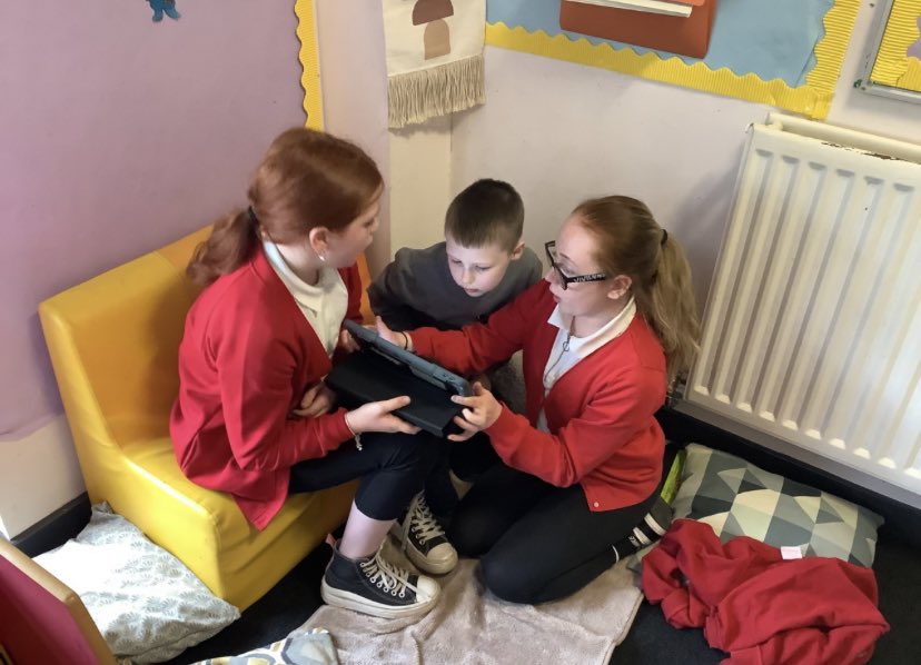 AntoninePrimary's tweet photo. Children in Primary 7/6 enjoyed a visit to Primary 2 to do some paired reading. Some of the children created their own story on Book Creator and shared their stories with the younger children. A lovely afternoon! #ReadingforEnjoyment #RobinRespect #CaptainKindness https://t.co/4ICbdRUFqS