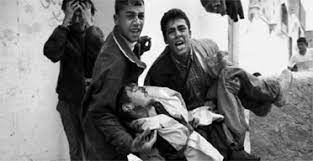 SaveSJarrah's tweet photo. Thomas Hurndall was a British photography student, a volunteer for the International Solidarity Movement (ISM) and an activist against the Israeli occupation of the Palestinian territories. On 11 Apr 2003, he was shot in the head for helping a child, in the #Gaza Strip by Israel. https://t.co/fLPGI632JK