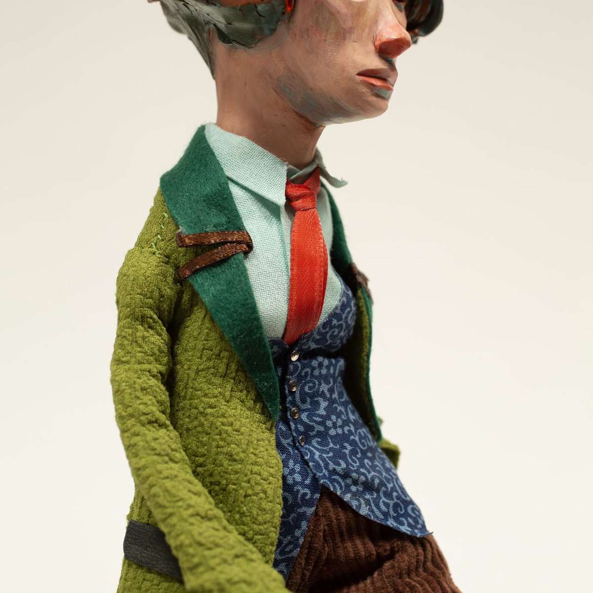 rednosestudio's tweet photo. ‘In Your Own Skin’ mixed media: polymer clay, aluminum wire, foam, fabric and wood. 5x11x7 inches. Part of an ongoing exploration, aiming to overcome my preconceived notions of what is acceptable character design, especially with female characters. https://t.co/aTyNNXxOPl