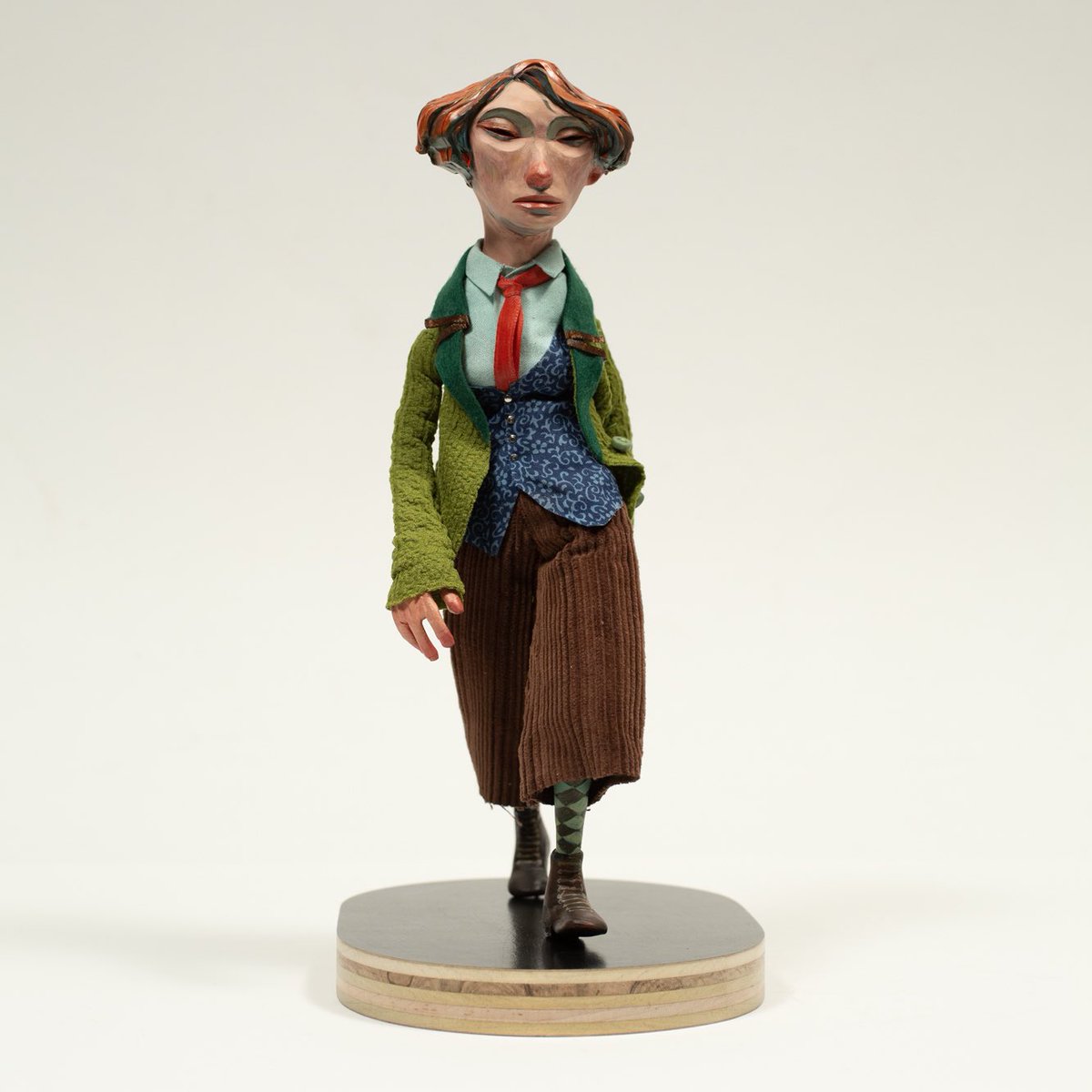 rednosestudio's tweet photo. ‘In Your Own Skin’ mixed media: polymer clay, aluminum wire, foam, fabric and wood. 5x11x7 inches. Part of an ongoing exploration, aiming to overcome my preconceived notions of what is acceptable character design, especially with female characters. https://t.co/aTyNNXxOPl
