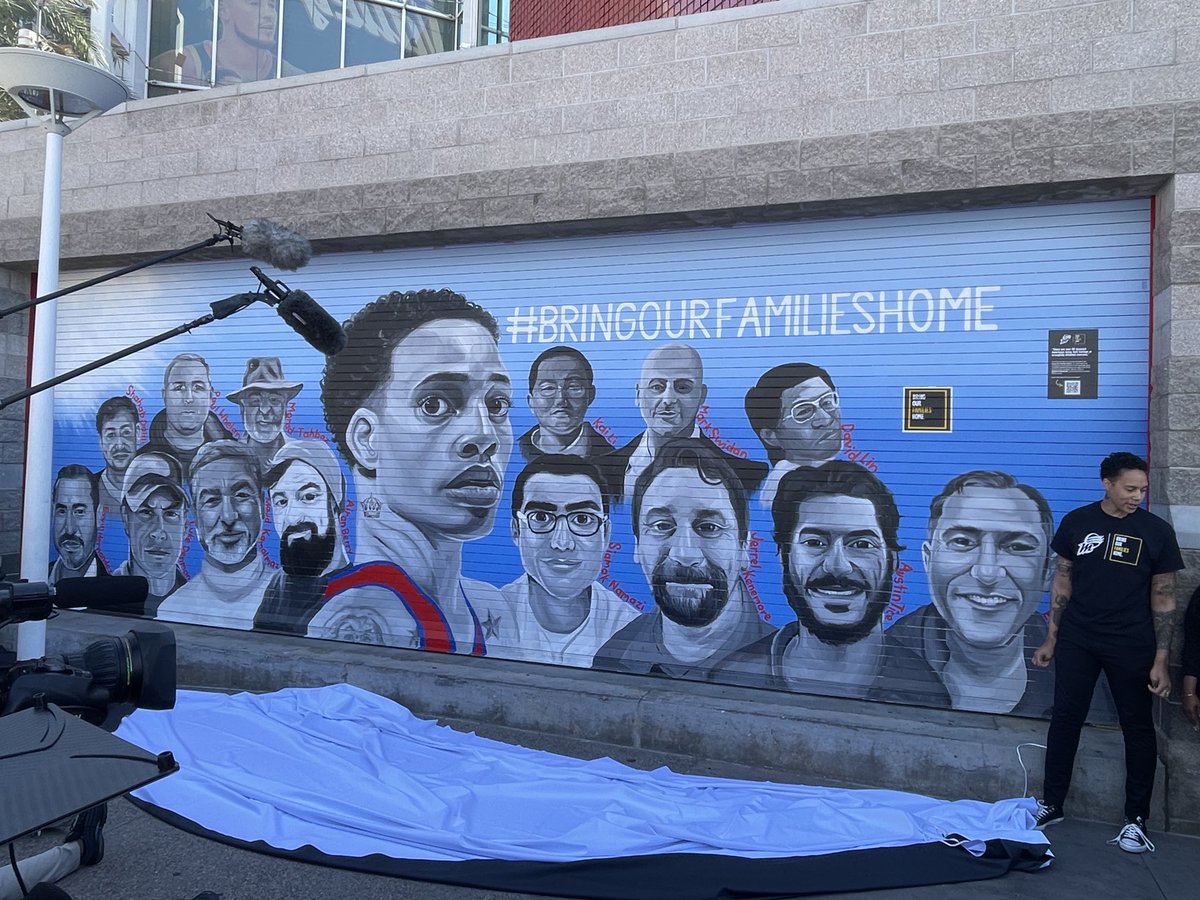 joshweinfuss's tweet photo. Brittney Griner unveiled a new mural outside the Footprint Center that paid tribute to wrongfully detained Americans. 

It was created by Phoenix muralist Antoinette Cauley. https://t.co/SiiuR4HuTF