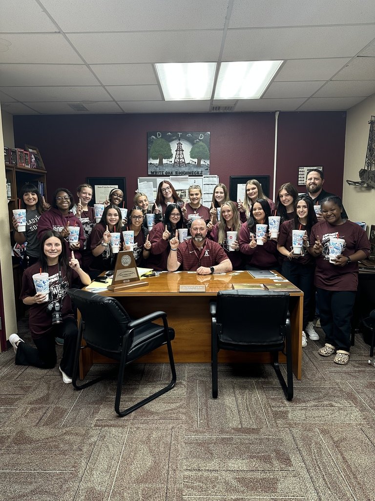 The varsity softball team enjoys Sonic drinks from high school principal, Jack Parker. The Ladynecks will face off against Elysian Fields tonight at 7:30 at ETBU. Game 2 same time and place tomorrow. night. Game 3 will be at 6:30 p.m. Saturday at ETBU if needed.