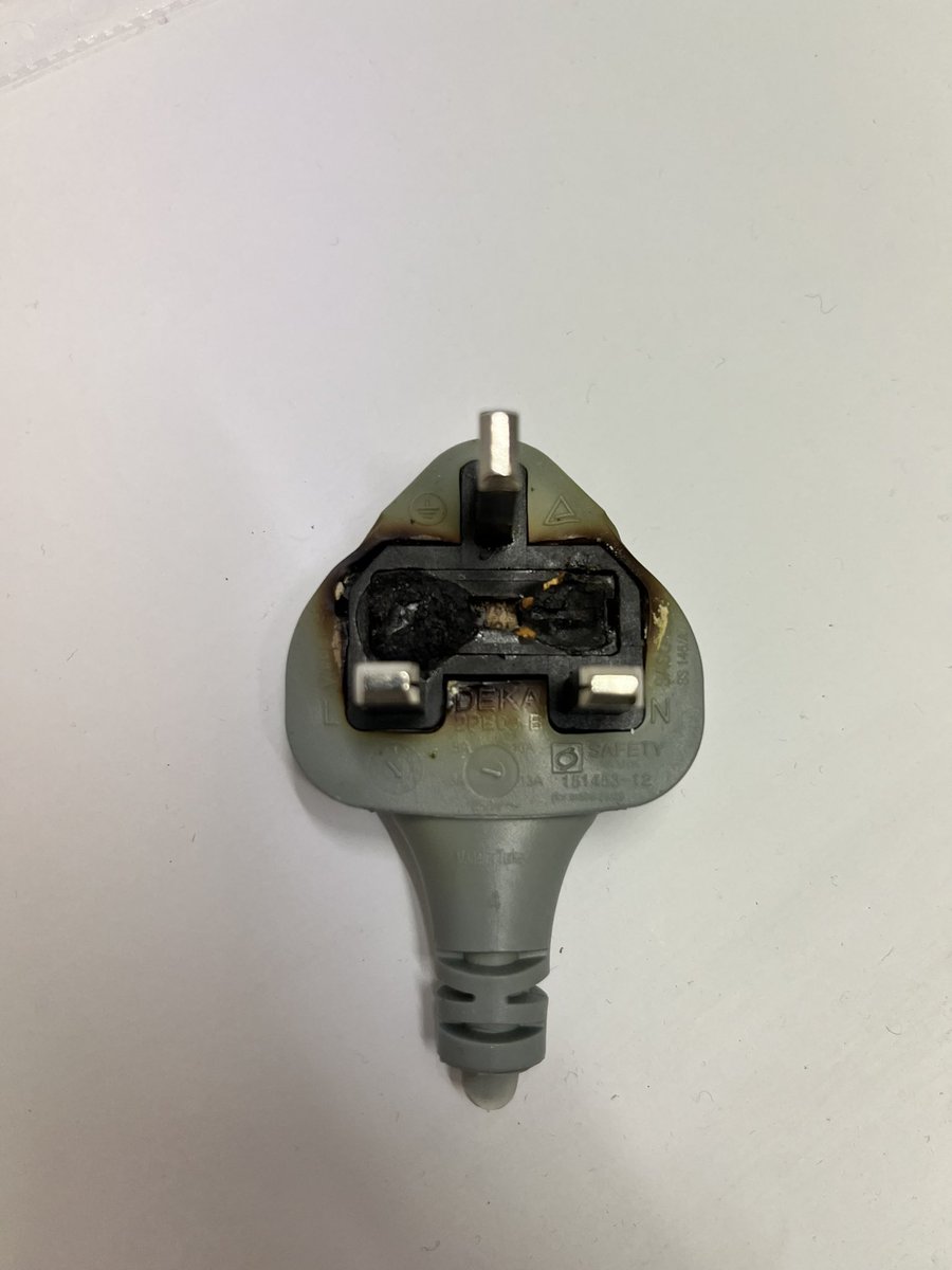 phazeelectrical's tweet photo. PAT Testing in Bromley today, laundry equipment with burnt plug - a real fire hazard. https://t.co/MrUSGxJFwV