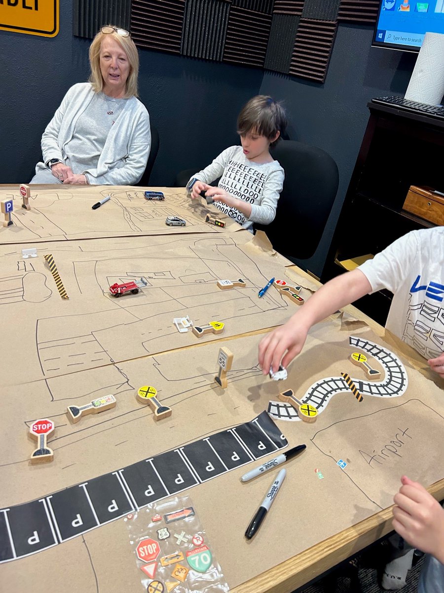 TREKKDesign's tweet photo. TREKK's Springfield team had a fun-filled #TakeYourChildToWorkDay. Their kids were busy building foil boats, constructing marshmallow towers, planning a city with roads and buildings, playing ping pong, tossing bean bags at the traffic light and launching rockets. #TREKKfamily https://t.co/LADiY6n0G5