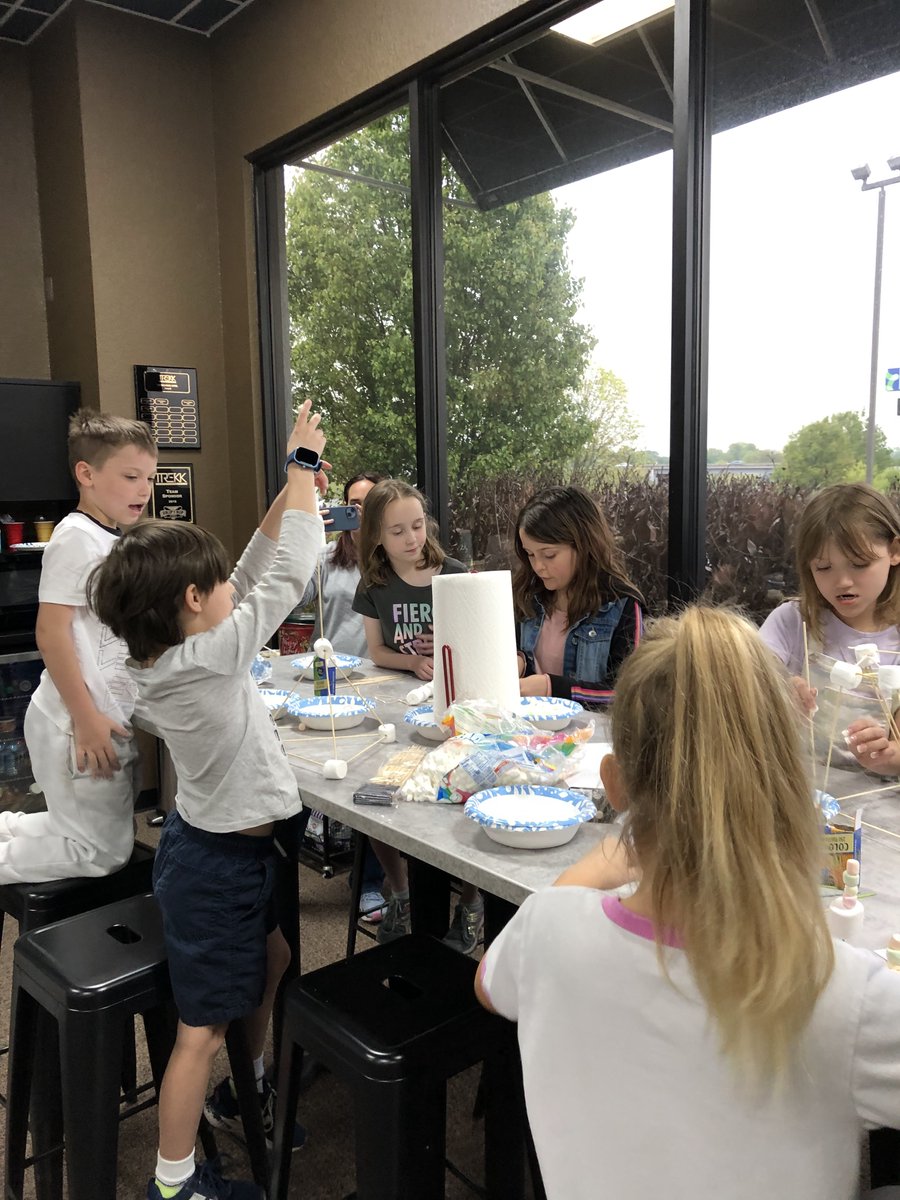 TREKKDesign's tweet photo. TREKK's Springfield team had a fun-filled #TakeYourChildToWorkDay. Their kids were busy building foil boats, constructing marshmallow towers, planning a city with roads and buildings, playing ping pong, tossing bean bags at the traffic light and launching rockets. #TREKKfamily https://t.co/LADiY6n0G5