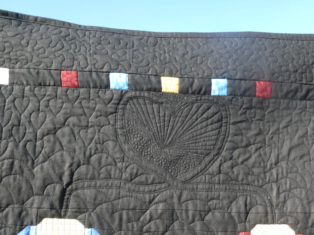 SusanBluerobot's tweet photo. I designed the piecing pattern using quilting assistance program inspired by a bookmark cross stitch kit I have. Pieced it together on my brother machine and quilted in on my capri long arm machine https://t.co/V2E4RsNqRW