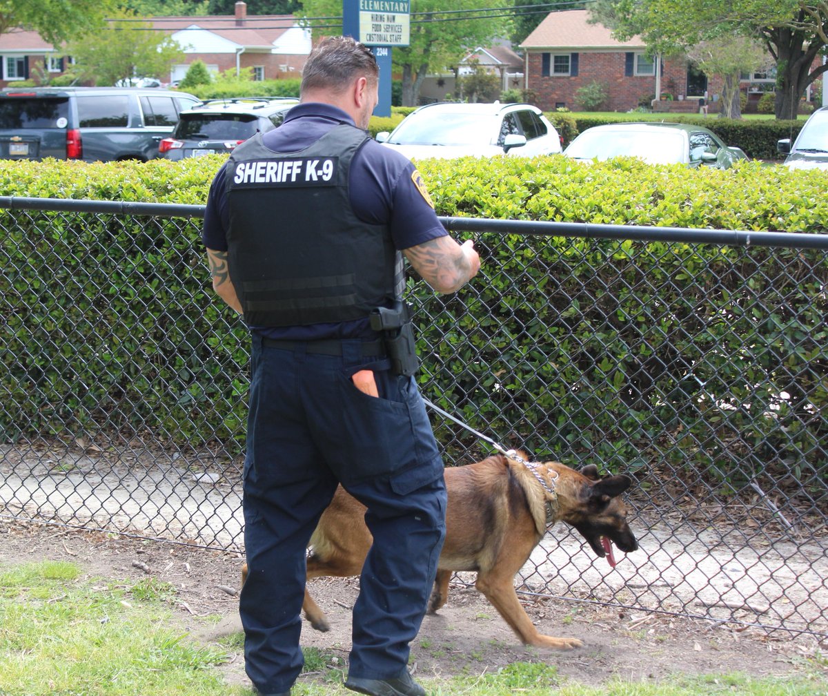 VBSO's tweet image. K9 Pablo awed kindergartners and teachers at Trantwood Elementary School Thursday with his extra keen snout. Sheriff @kenstolle even put a drug-smelling rag in his pocket to show the kids how quickly Pablo can detect an illegal substance. #goodboyPablo #k9handler #k9training