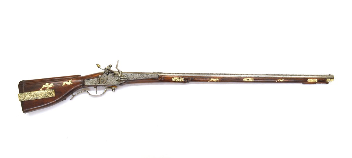 A lever-action flintlock from 1683. Signed "Dorrtlo" and dated on the breech, this rifle uses the trigger guard as a lever to rotate the breech after each firearm and pick up powder and a new projectile from internal magazines.