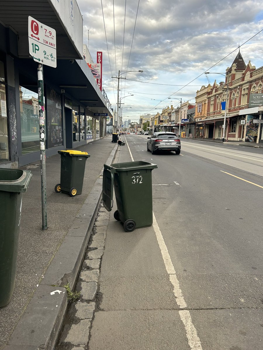 Hello <a href="/MerribekCouncil/">Merri-bek City Council</a>! I moved half a dozen wheelies bins off the city-bound Sydney Rd bike lane this morning but couldn’t do much about these skips! Any chance the lane could be made, you know, safe for cyclists?