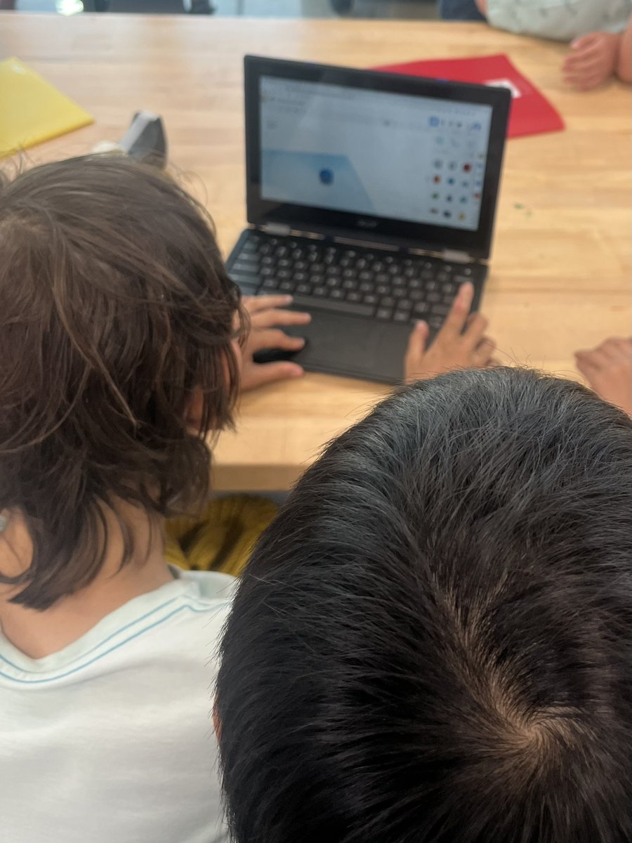 5th graders helping their 1st grade little buddies learn how to create, define, and modify shapes in tinkercad.