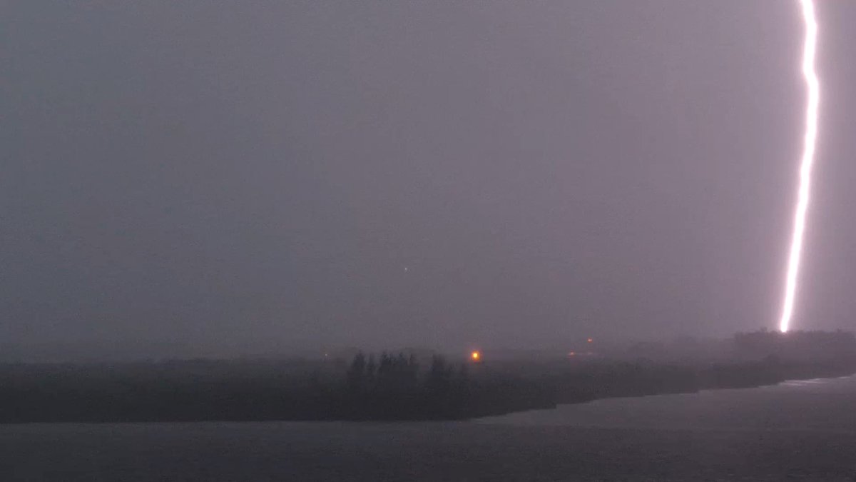 SpaceflightNow's tweet photo. SpaceX has scrubbed tonight's launch of a Falcon Heavy after severe weather struck the Kennedy Space Center area: https://t.co/bnKR6bILaD https://t.co/XqdHF662X4