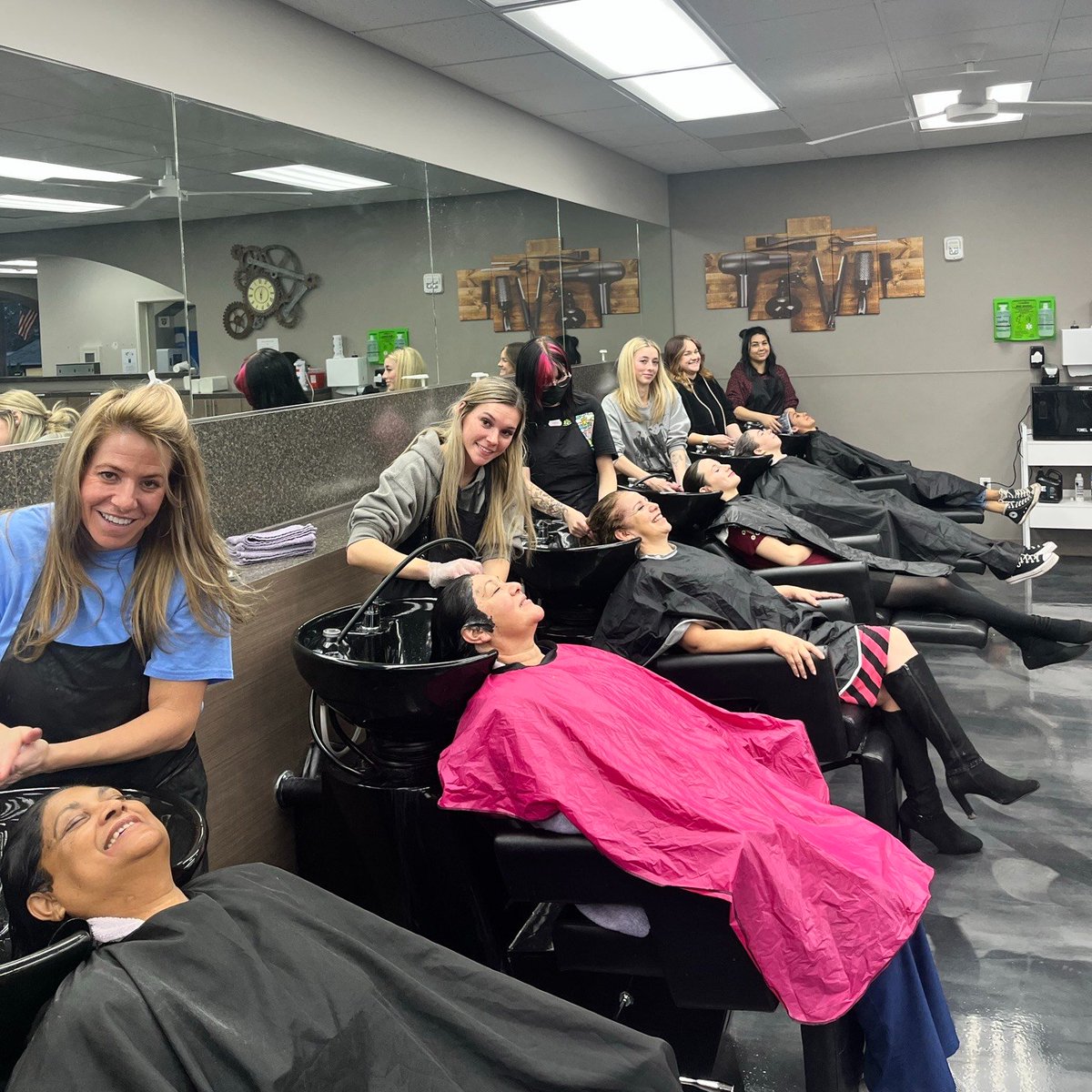 Evening Cosmetology students hone their hair washing skills during a busy night in the salon!

To make an appointment at The Salon at Simi Institute, please call 805.579.6275.