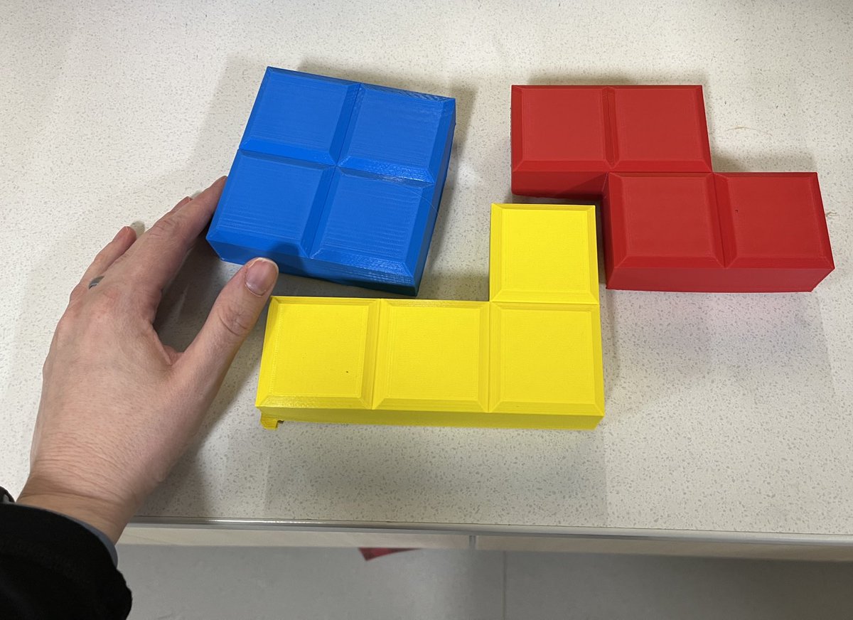 KNgaiSci's tweet photo. Student designed 3D printed Tetris pieces to be used as part of a magnetic sensory wall at our Intermediate School. Nice work Innovations students! #wjjms #stem https://t.co/4IBsVBk08A