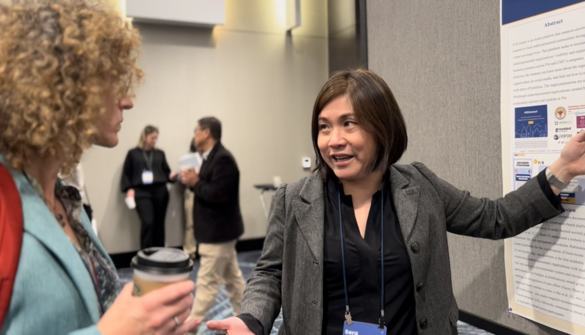 Pitt_SPIA's tweet photo. At the bustling #UAA2023 poster session, @GSPIA Assoc Professor @seralinardi talked scavenger hunts! @CaasiPittโs #412Connect platform connects university students local Black and minority-owned businesses in Pittsburgh through social media visibility and interaction. https://t.co/qBUS0hsYLq