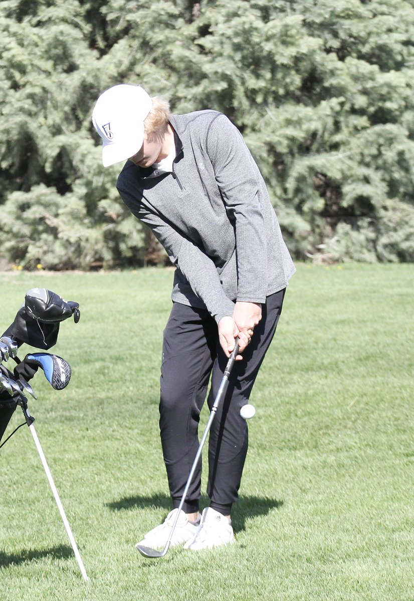 GOLF: <a href="/SamEhlers5/">Sam Ehlers</a> of <a href="/cpsbroncos/">Centennial School</a> chips toward the eighth green at the Crete Invitational April 27. #broncoblue #shortgameisimportant