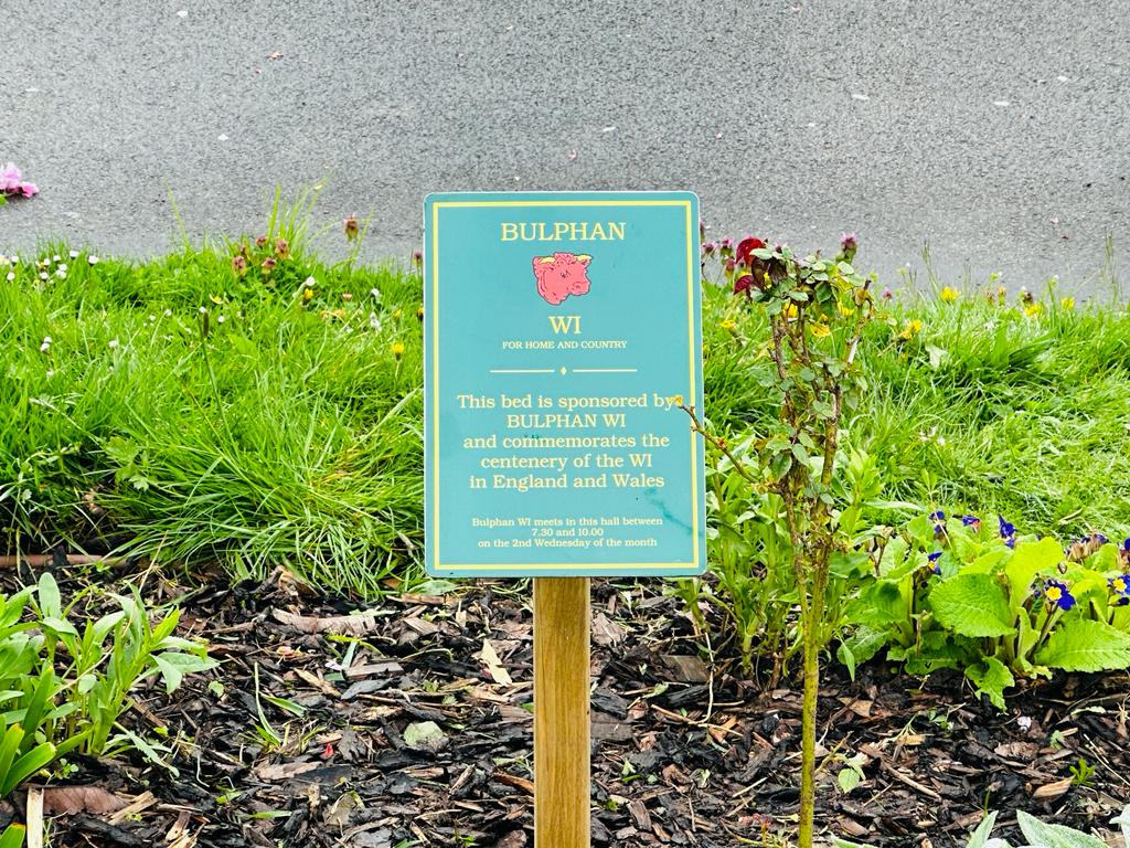 BulphanWI's tweet photo. Our flower bed sign has been refurbished and is back in place at village hall @WIEssex @WomensInstitute @WILifemagazine https://t.co/9NUIHcQvXa
