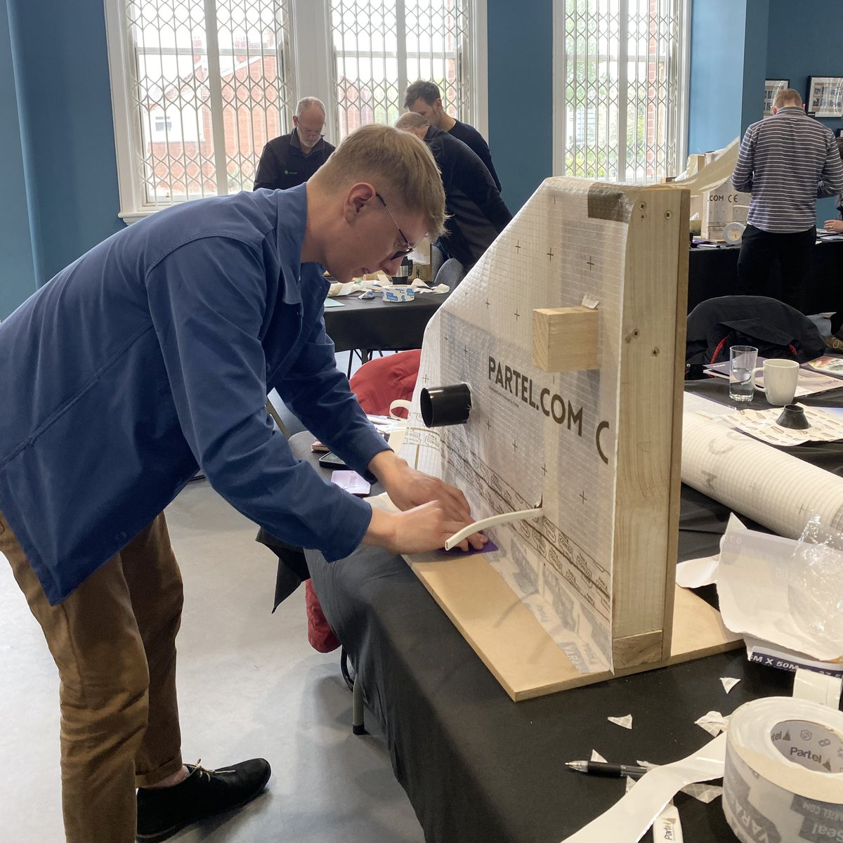 ProgInPrac's tweet photo. Great turnout for yesterday’s #airtightness and #vapourcontrol workshops and everyone got stuck in. Lovely to work with @Partel_Passive and @PeopleRetrofit to make these happen. Which low energy building or #retrofit skills workshop would you want to see next? https://t.co/nfwPHq7N9Q