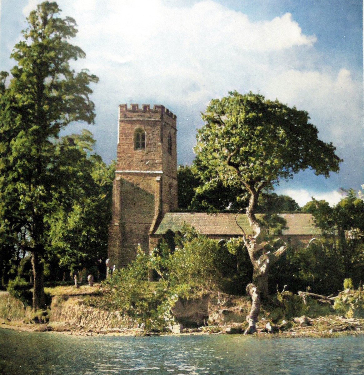 St Winnow church on the bank of the River Fowey near Lostwithiel, Cornwall ~1955