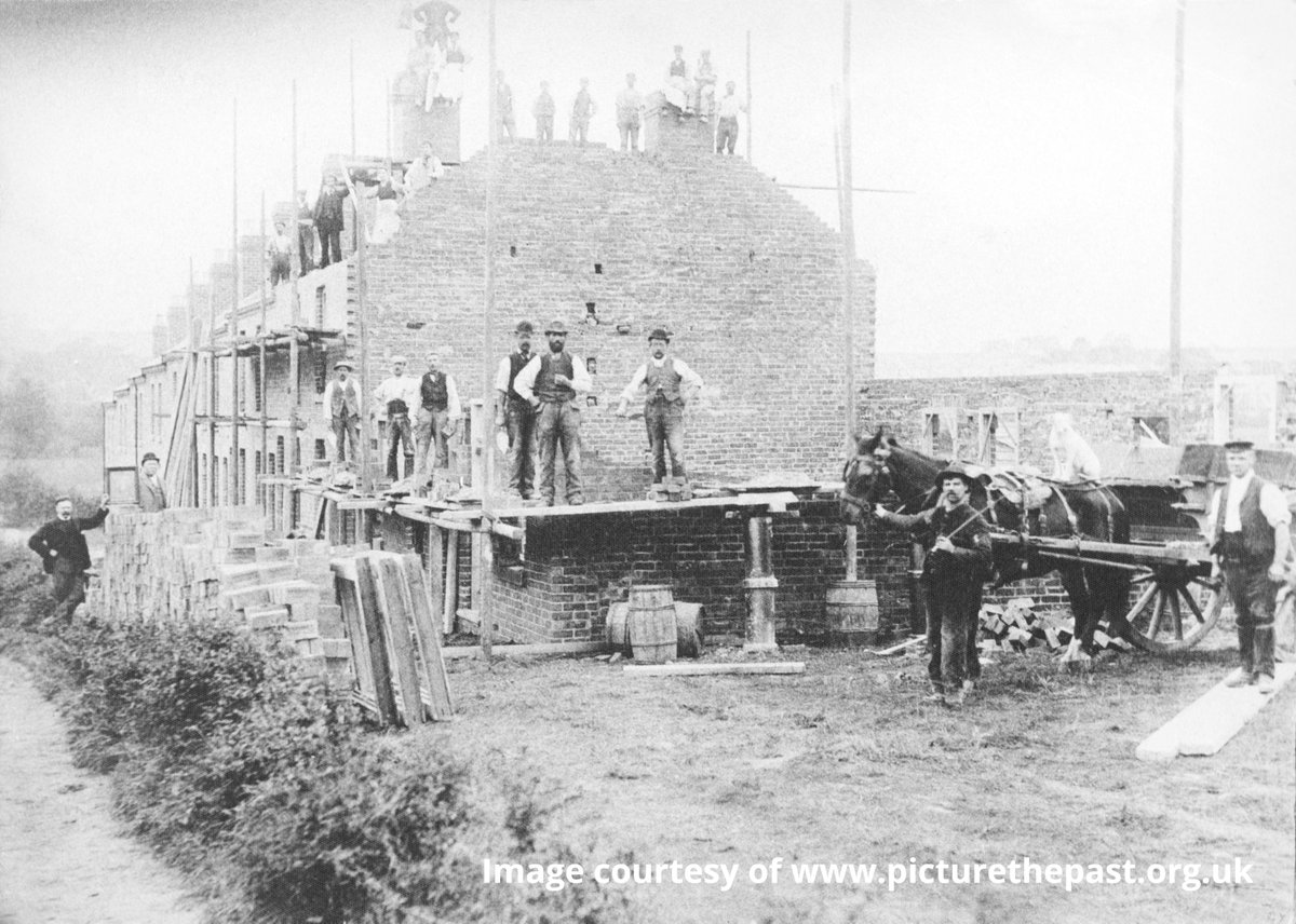 We travel back to late 1890s Shirebrook for #PhotoFriday.  Here workers are busy building houses, possibly for the new Model Village. 
On #WorldDayForSafetyAndHealthAtWork we’re not too sure how safe these workers are? Particularly those quite casually balancing on chimneys!