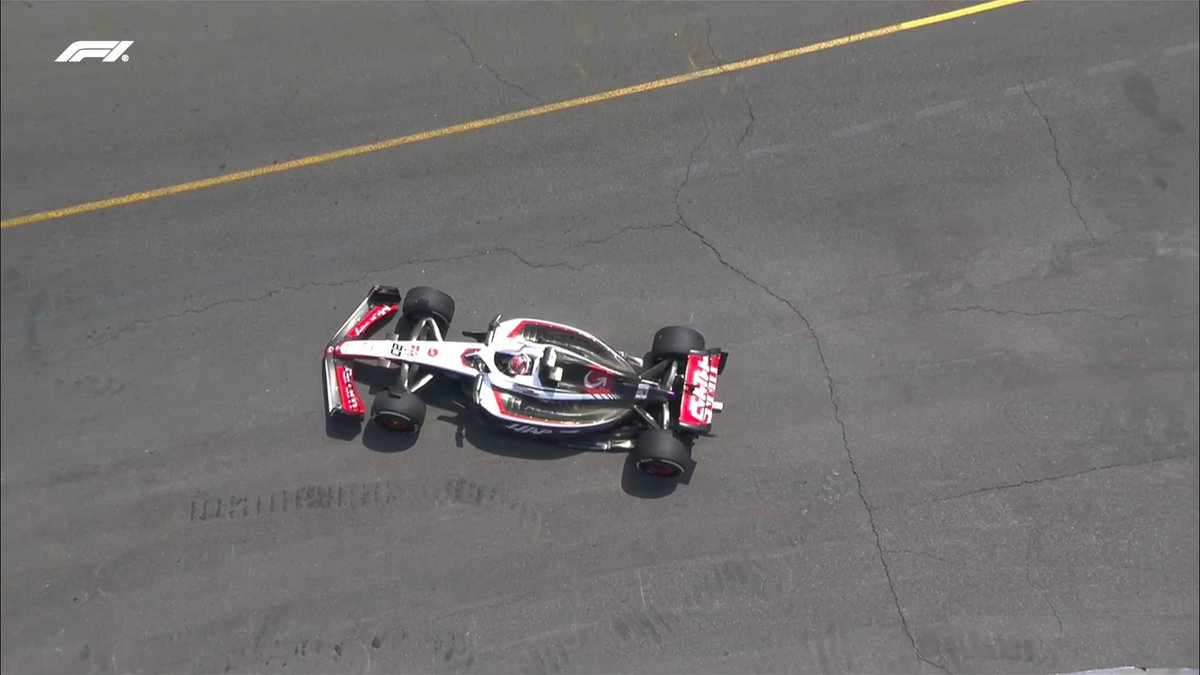 F1's tweet photo. 🚩 RED FLAG 🚩

Smoke pours out of Pierre Gasly's car 

Kevin Magnussen is also stranded down at Turn 1

#AzerbaijanGP #F1 https://t.co/DKfwHRIFwd