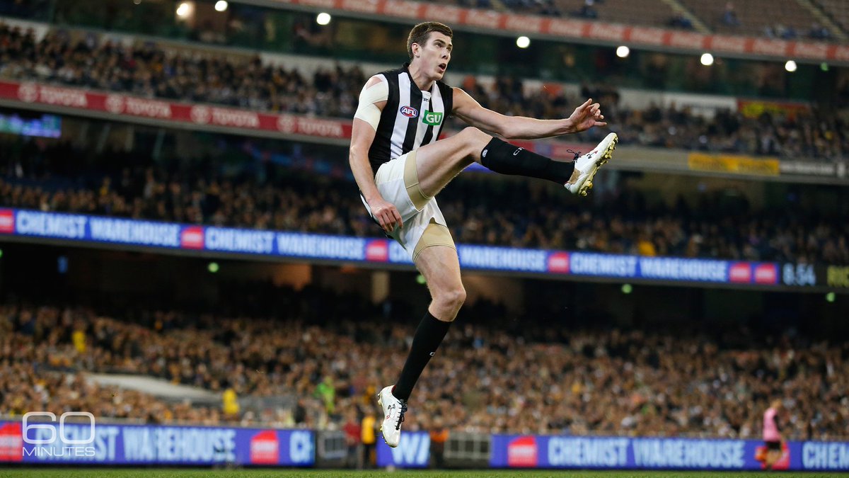 60Minutes's tweet photo. This sport makes American football look like a quilting bee. Australian rules football has almost cartoonishly violent collisions — all played without pads. This Sunday, 60 Minutes meets the nearly 7-foot-tall Texan who has risen through the ranks. https://t.co/yct4yZkjAU