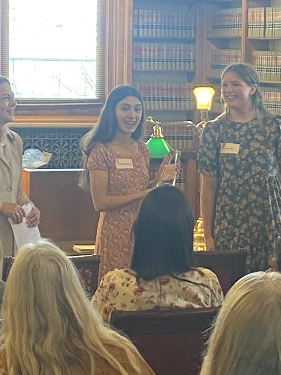 Lola Nakashima Brooke receiving the Iowa Student Poet Ambassador award at the State Capitol