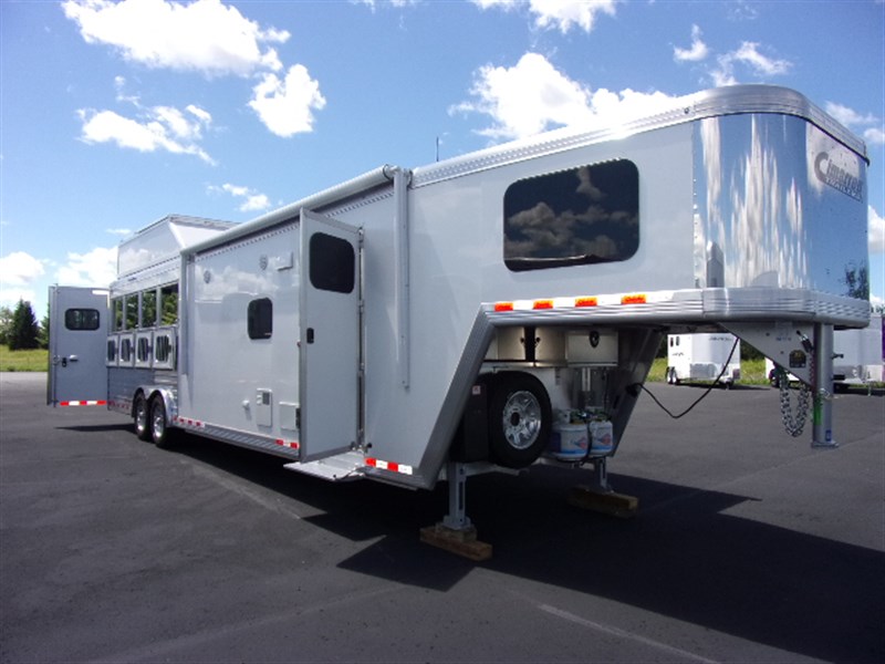 2023 Cimarron Norstar with Outback Custom Interior   - $149,897.00
spartachevytrailers.com horsetrailerworld.com/home/trailerde…