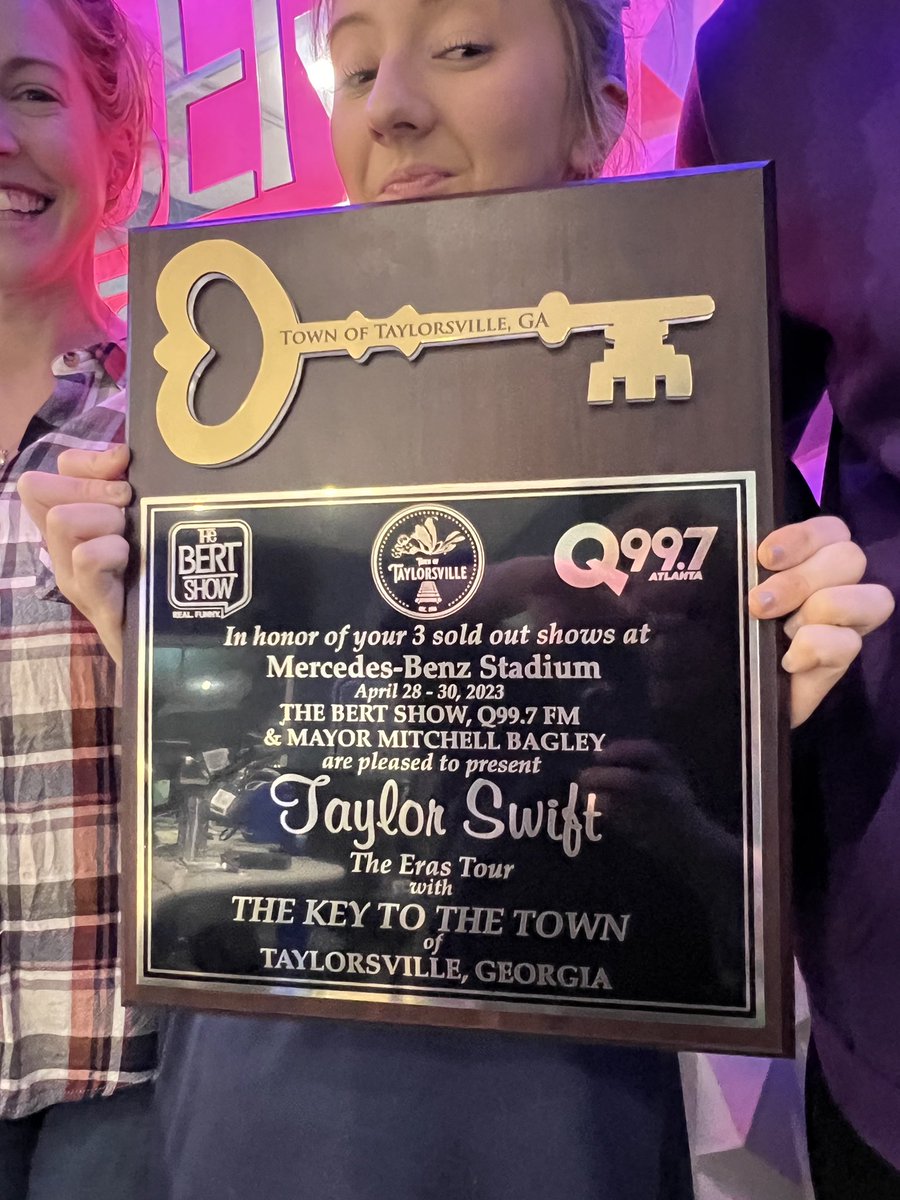 Q997Atlanta's tweet photo. It’s finally here… @taylorswift13’s The Eras Tour is taking over the A! The town of TAYLORsville, Georgia & @TheBertShow wanted to celebrate in ✨style✨ with the key to the town! Happy official “Taylor Swift Day” 🤩
#WelcomeToATayL #AtlantaTSTheErasTour #TSTheErasTour https://t.co/YNgQ8nK3yT