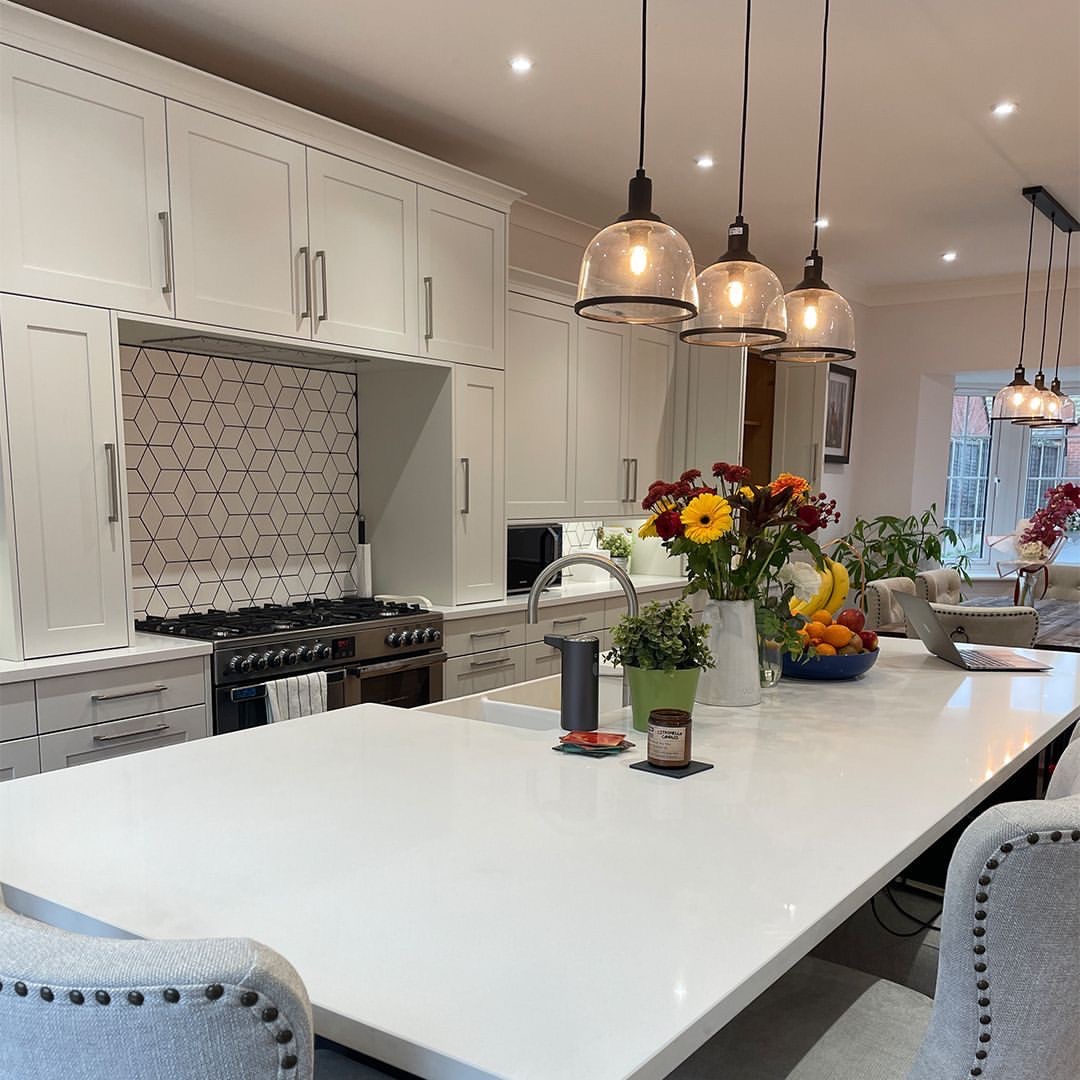 The perfect kitchen for a bank holiday weekend. Lumina Stone Astral White worktops.