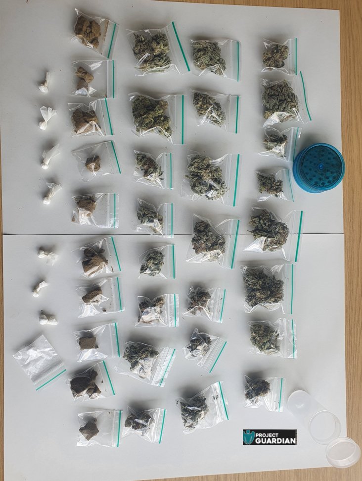 GuardianWMP's tweet photo. A 'Drugs Orientated' day for Task Force Officers with numerous positive Stop/Searches conducted. This haul was seized in @HodgeHillWMP. The 2 subjects fell off their expensive Scooter & this was seized, as well as the haul of Class A & B Drugs below @ROCUWM #Seized #WeCanRun https://t.co/HAZR52ncW4