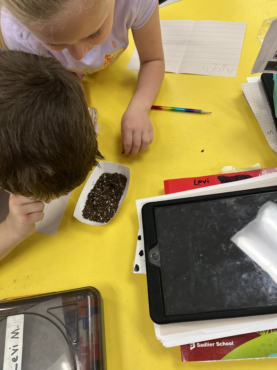 After talking about the different types of soil. Students took magnifying glasses and looked at them and wrote down their observations!