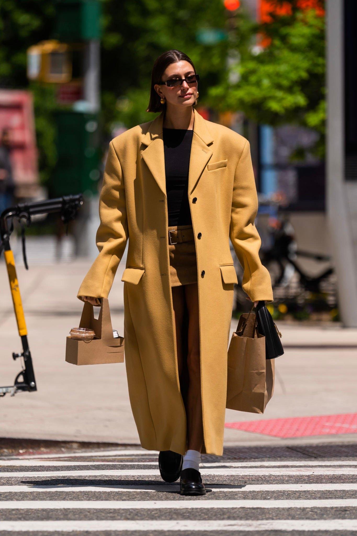 Hailey Bieber arriving at her apartment after leaving the Maman coffee shop  in Tribeca, New York. (May 10, 2023) in 2023