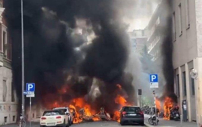 TheInsiderPaper's tweet photo. BREAKING ALERT: Multiple vehicles on fire in the center of #Milan in northern Italy after large explosion - reports https://t.co/tzjrG7If0l