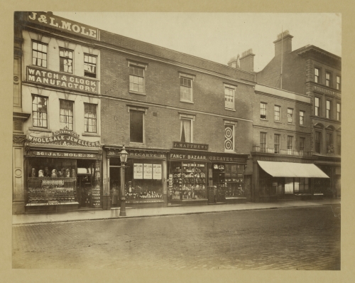 J & L Mole, 'watch and clock manufactory' and 'wholesale jewellers', 1876. Standing on the north side of New Street, these shops would be demolished to make way for the cutting of Corporation Street.  bit.ly/3BekIEm #Birmingham #Shops #Brum #jewelleryshop