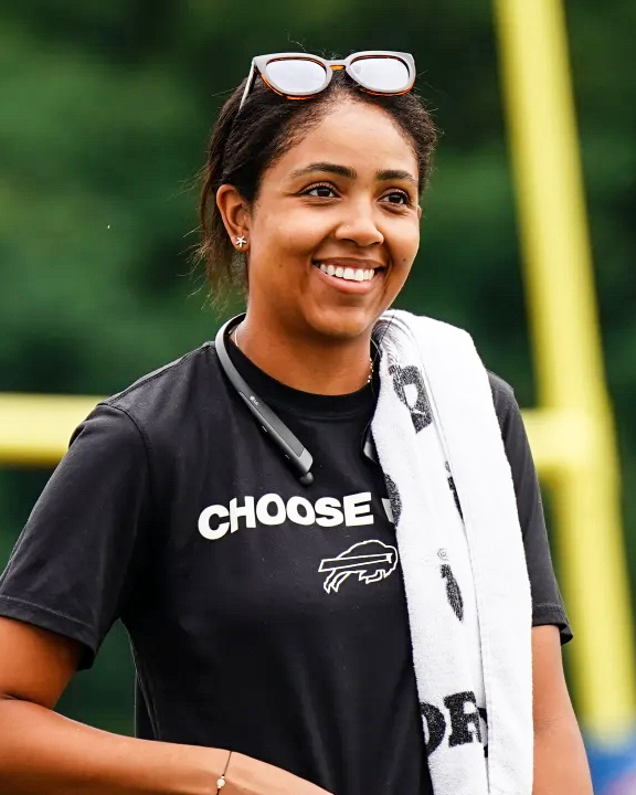 The Buffalo Bills have hired Marissa Figueroa, the first woman to become a full-time athletic trainer in franchise history.
