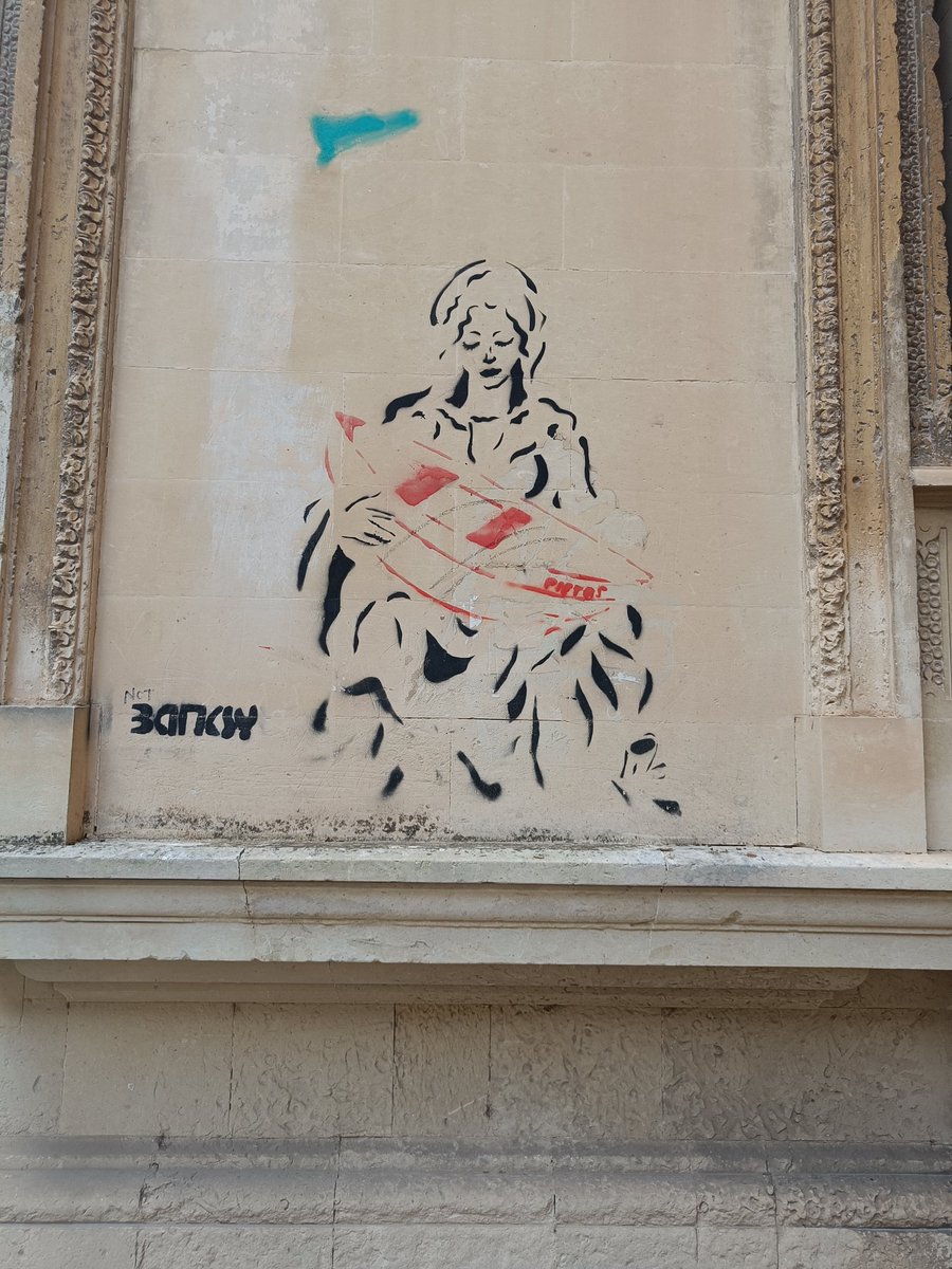 Graffiti on the Duomo in Lecce, where many small boats arrive.