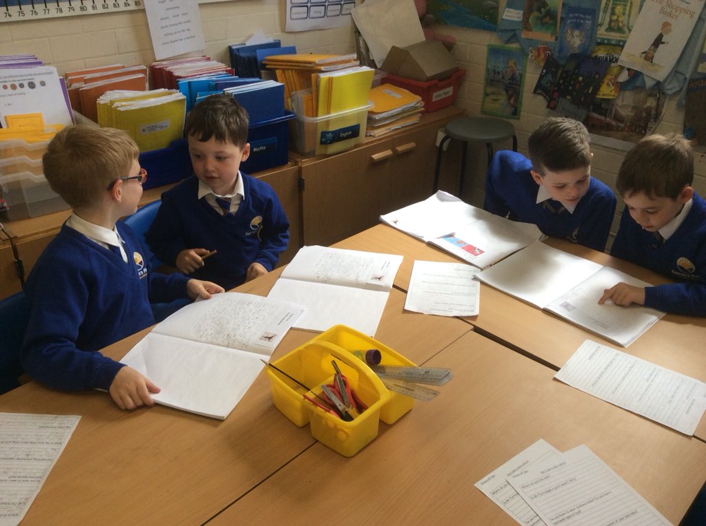 Reading our work to our friends. We enjoy sharing our work!