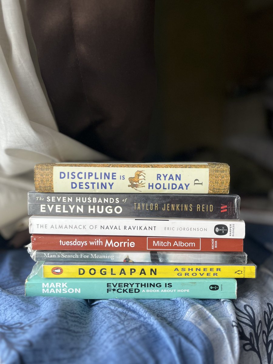 Curlyarsh's tweet photo. Homecoming read check!  
+2 reads that await the home library. 
Summer vacay solace🏝️ https://t.co/o9wW37eCdl
