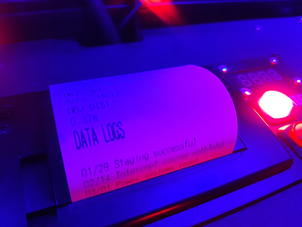 its_natclayton's tweet photo. Coolest game at AMaze by far is the mars rover cabinet with a stack of required manuals and handbooks and documents that prints surface scan data.

(Lost on Mars by Trey Ramm) https://t.co/drwwdoiyQJ