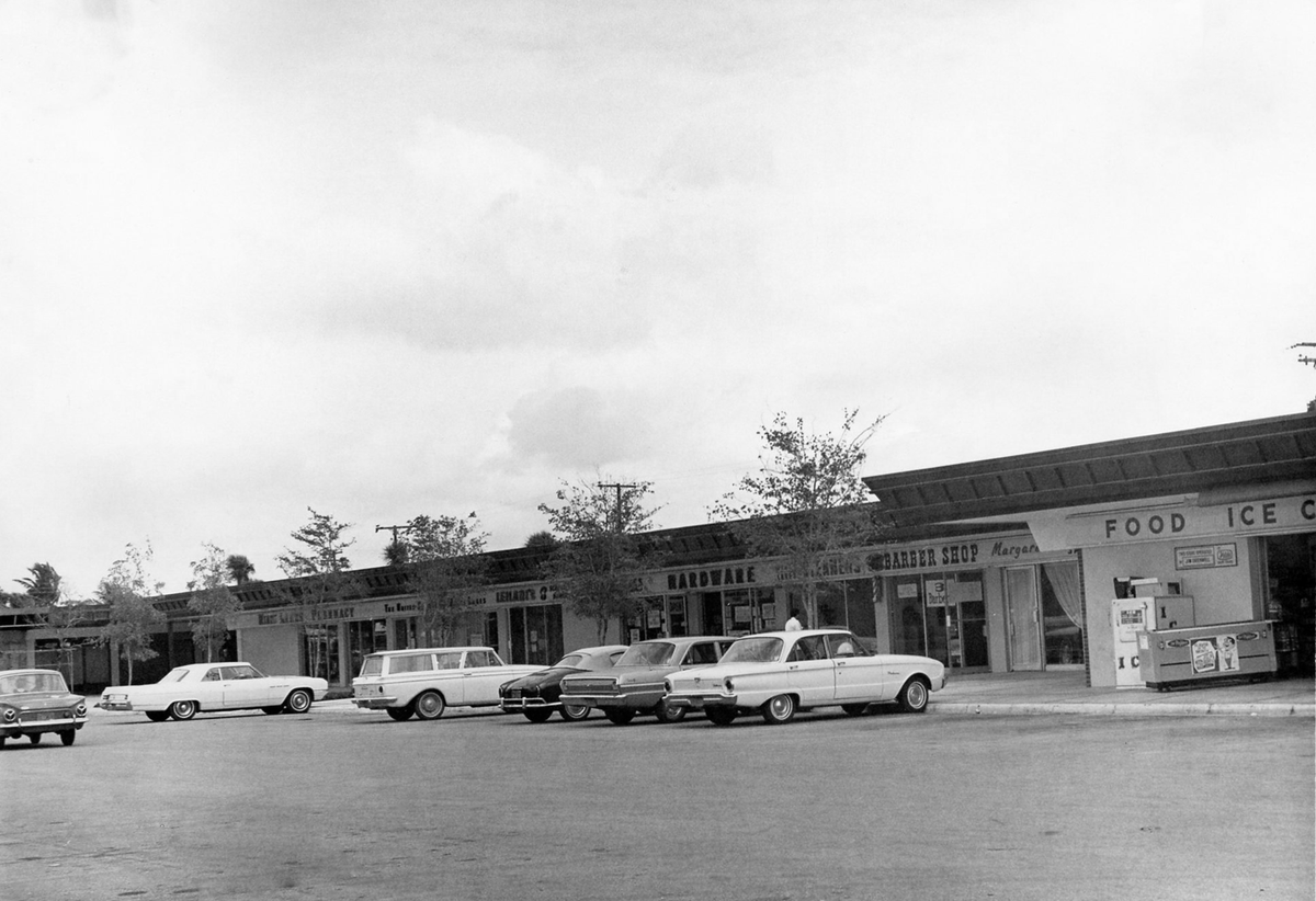 MiamiLakesNews's tweet photo. Did you know that the Miami Lakes Barber Shop at the Lake Patricia Shopping Center has been around since the plaza first opened in 1964? In this #TBT, alongside some SWEET rides, you can see the original spot in town to get a nice trim!💈 #MLHistory https://t.co/hZWZpxB5ID