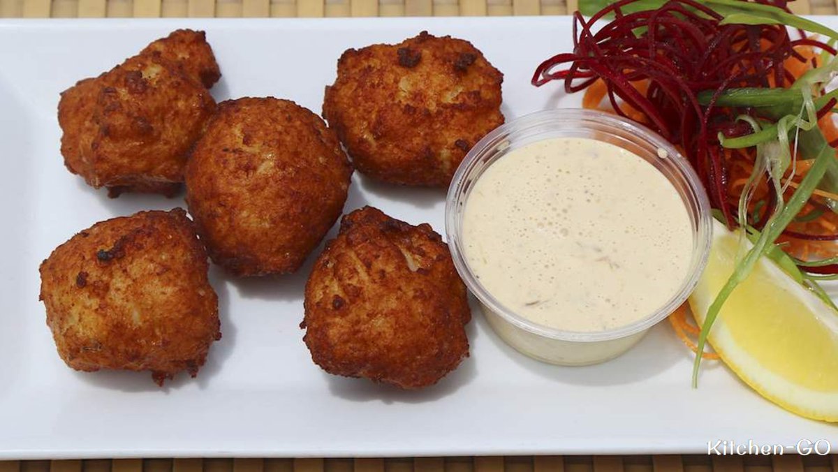 A delicacy of Caribbean and Creole cuisine, conch fritters are the national dish of sunny Bahamas #conchfritters #bahamas #nationaldish #carribbean #creole #internationalcuisine #kitchengo #cooking #foodie #foodlover #herbs #spices #herbsandspices #shakers #grinders