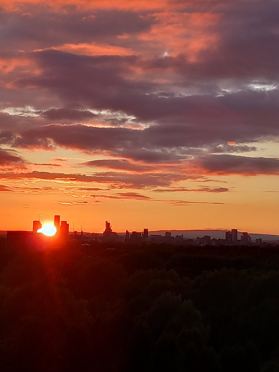 The sunsets have reached the city centre now behind the Deansgate Square apartment blocks. On midsummers day from our angle in Reddish, the sun will set directly behind the Winter Hill TV mast that can be seen on the moors to the  right