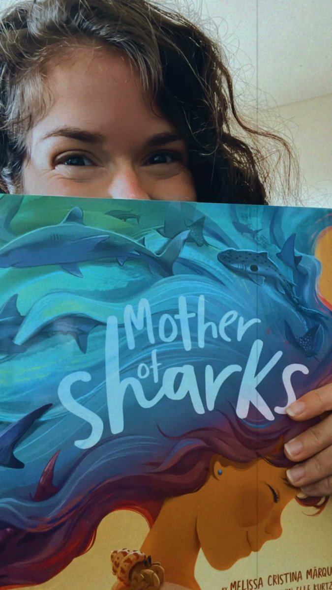 Look who FINALLY got her physical copy of her #MotherofSharks #picturebook! I cannot believe this beauty (no one can deny this book is GORGEOUS) will be out in just a few short days. Don't forget to pre-order your copy of this #kidlit book today: buff.ly/3EuamT8 #sharks